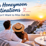 Couple enjoying a romantic sunset overlooking the sea and whitewashed buildings in Santorini, Greece